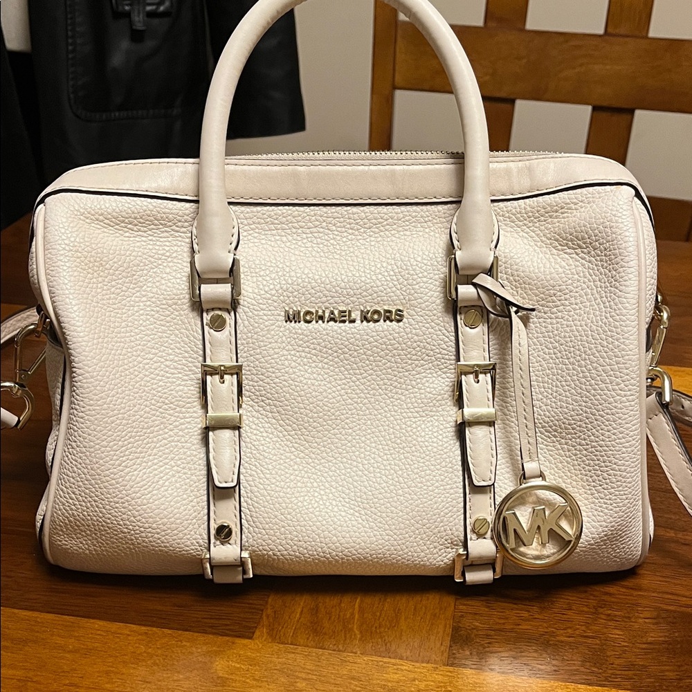 Michael Kors Cream Satchel with silver Accents, grain leather, handles wear